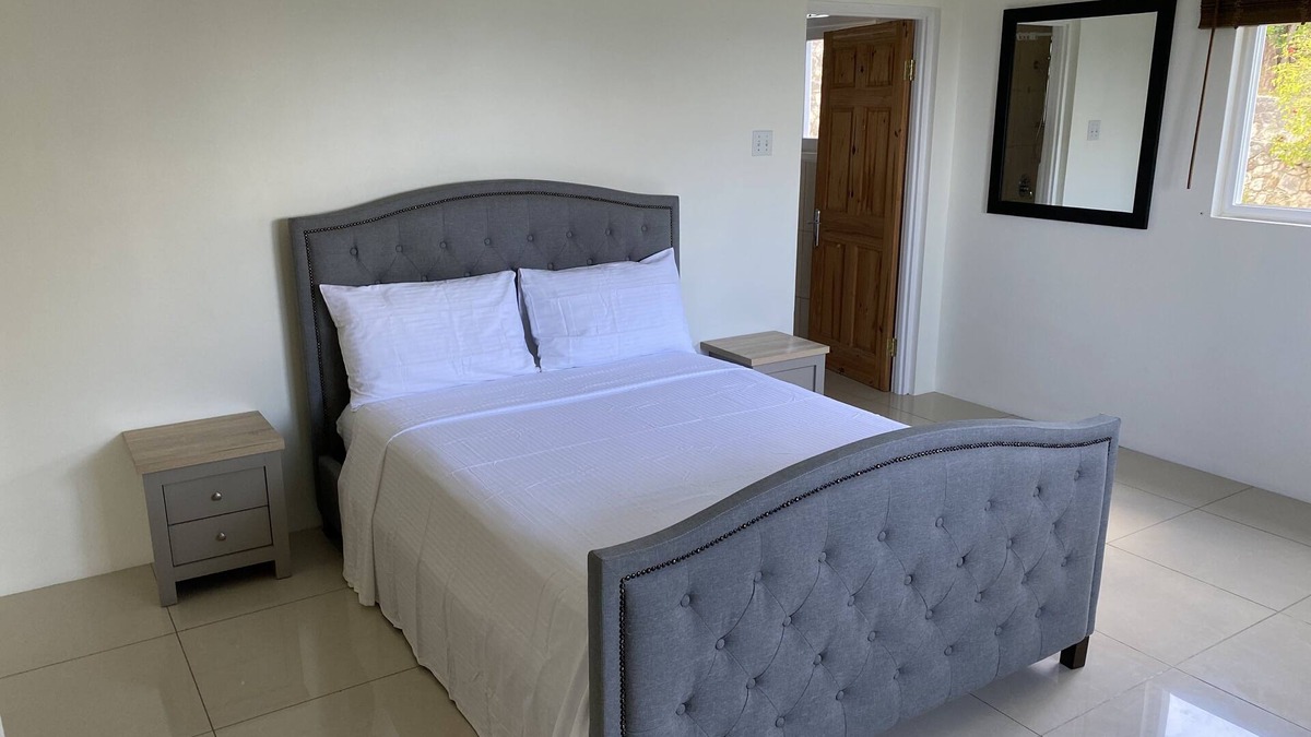 IronShore Estates Apartment | Beautiful sea view flat in coral gardens 10 min fr airport 15 min fr night life