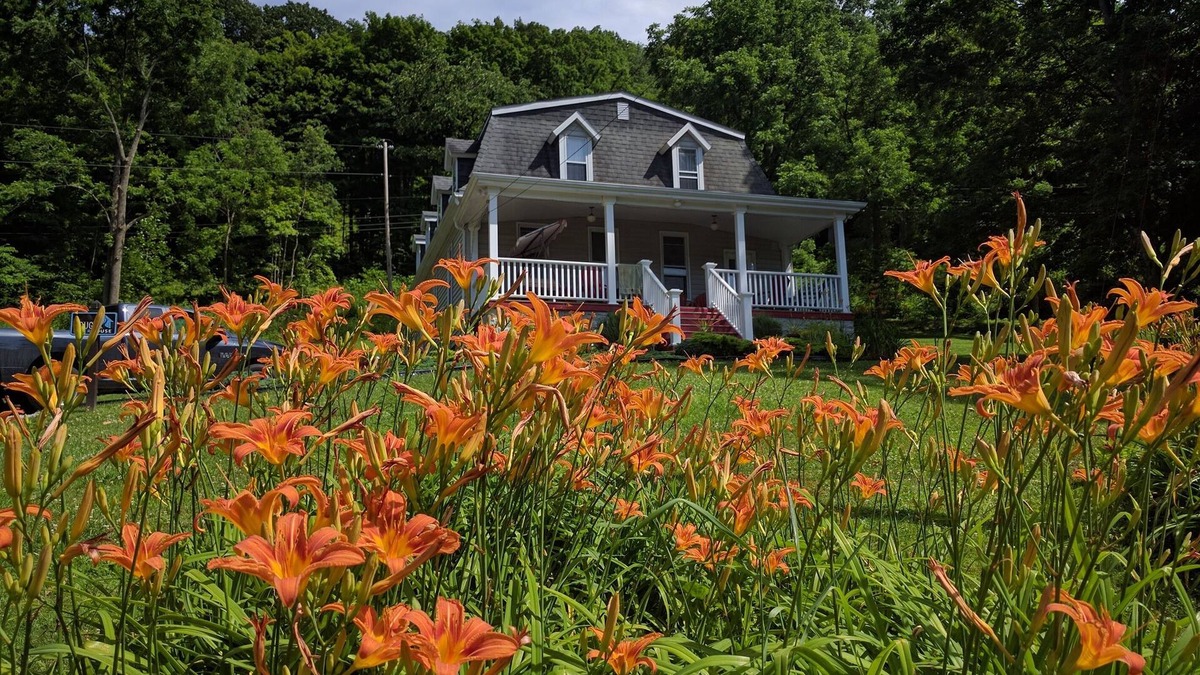 Confluence House | Beautiful, spacious home on Yough River and bike trail with hot tub