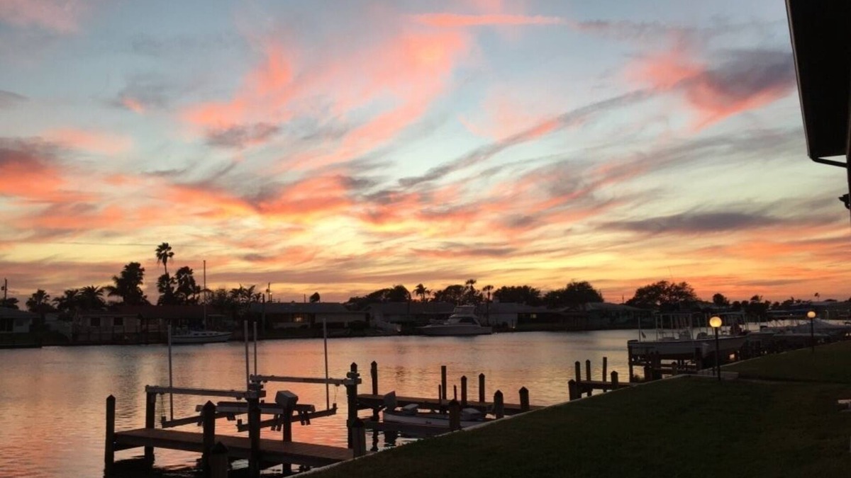 Cocoa Isles Condo | Beautiful sunsets from this ground floor Waterfront Condo - 3 month minimum