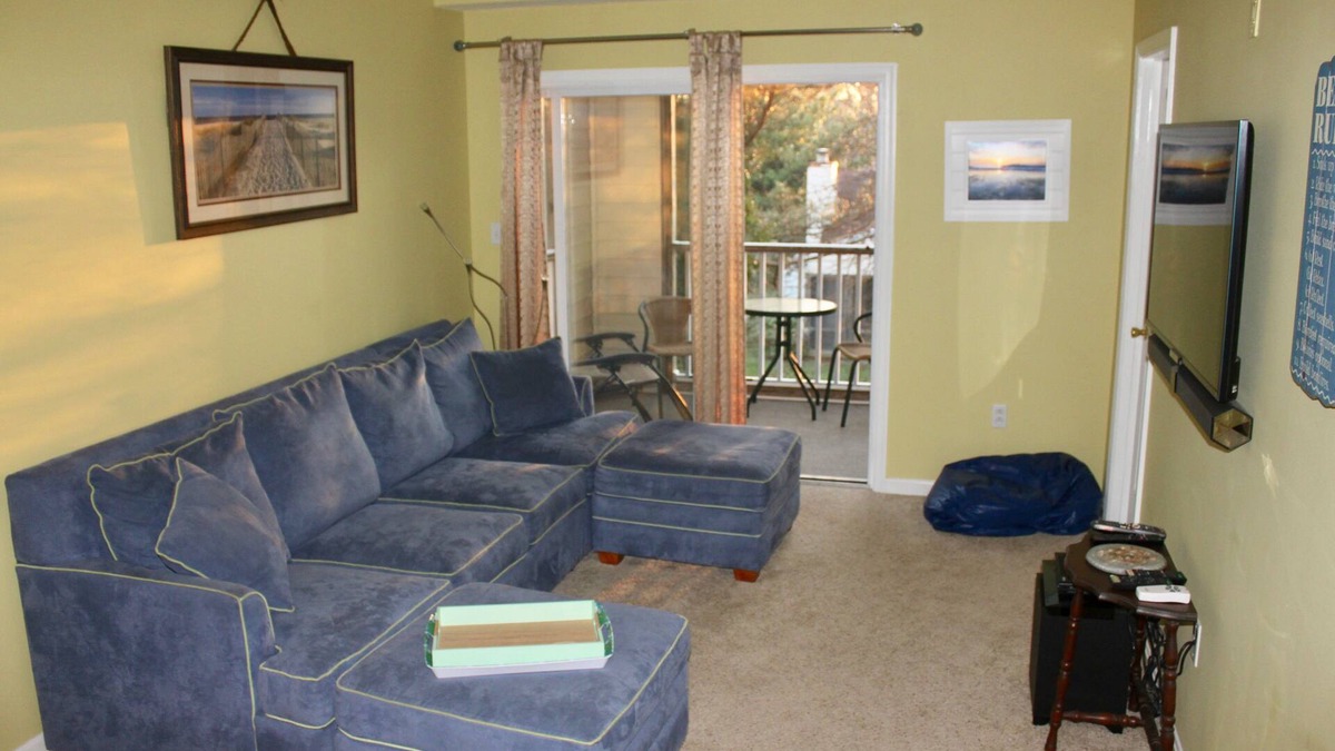 Rehoboth Beach Condo | Beautiful tranquil setting with pool or walk to the beach, shopping and dining.