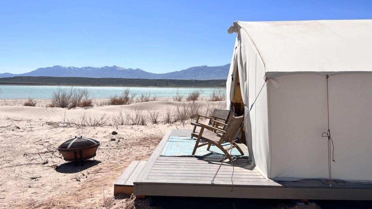 Levan House | Beautiful wall tent on sandy beach at waters edge
