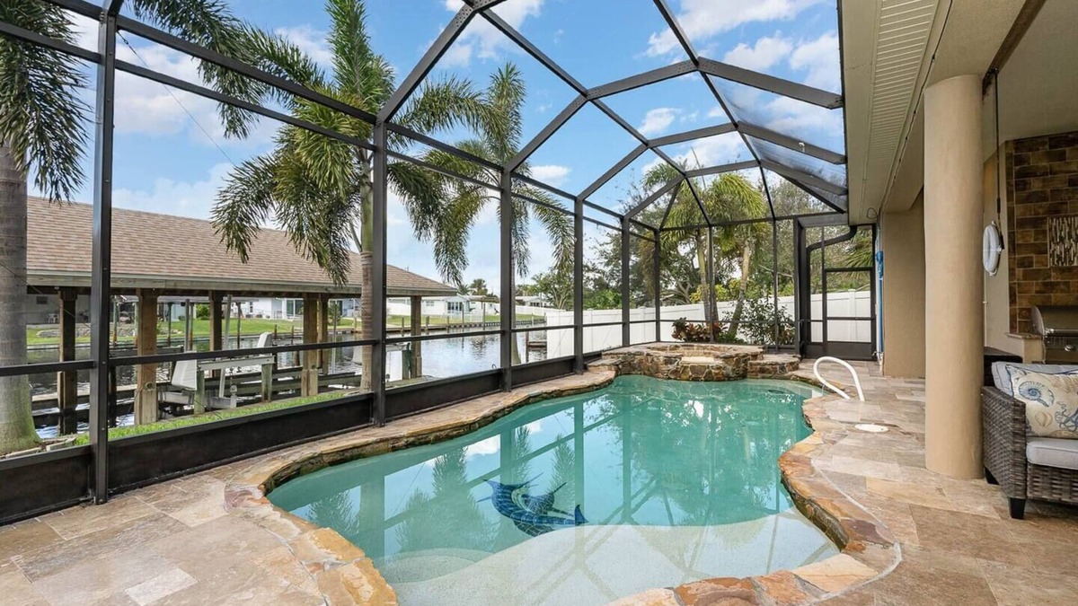 River Isles House | Beautiful waterfront 5 BR home with pool, kayaks