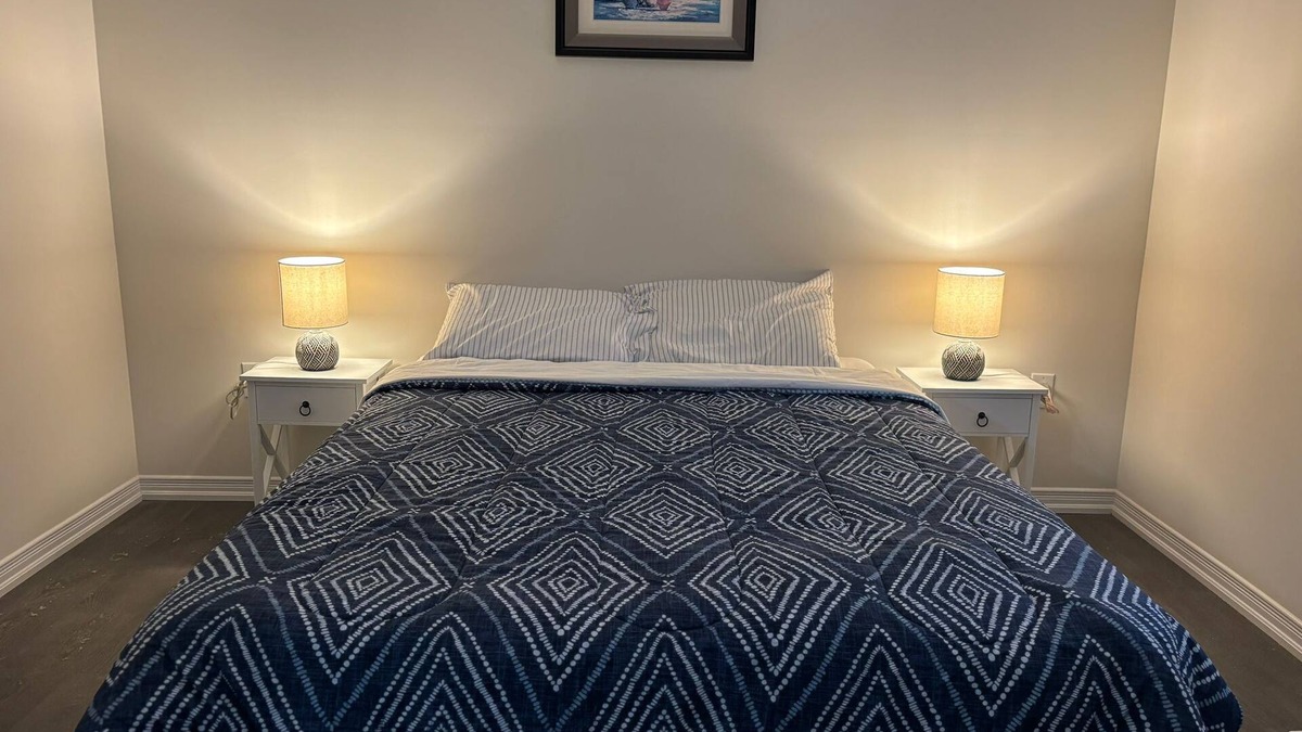 Thorold House | Bedroom Ensuite (Unit 1) @Welland, ON…a cozy bedroom space with jacuzzi