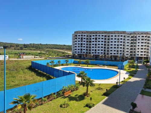 La Nouvelle Ville Ibn Batouta Apartment | Bel appartement avec piscine à deux pas de la mer
