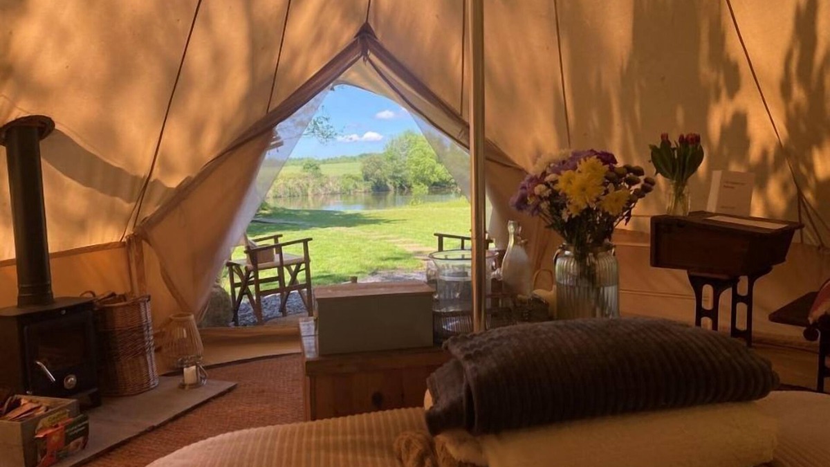 Washford Cabin | Bell tent in ultimate luxury with a wood fired hot tub, super king size bed