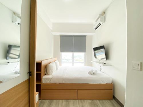 Cikarang Apartment | Best Homey 1BR at Vasanta Innopark Apartment By Travelio