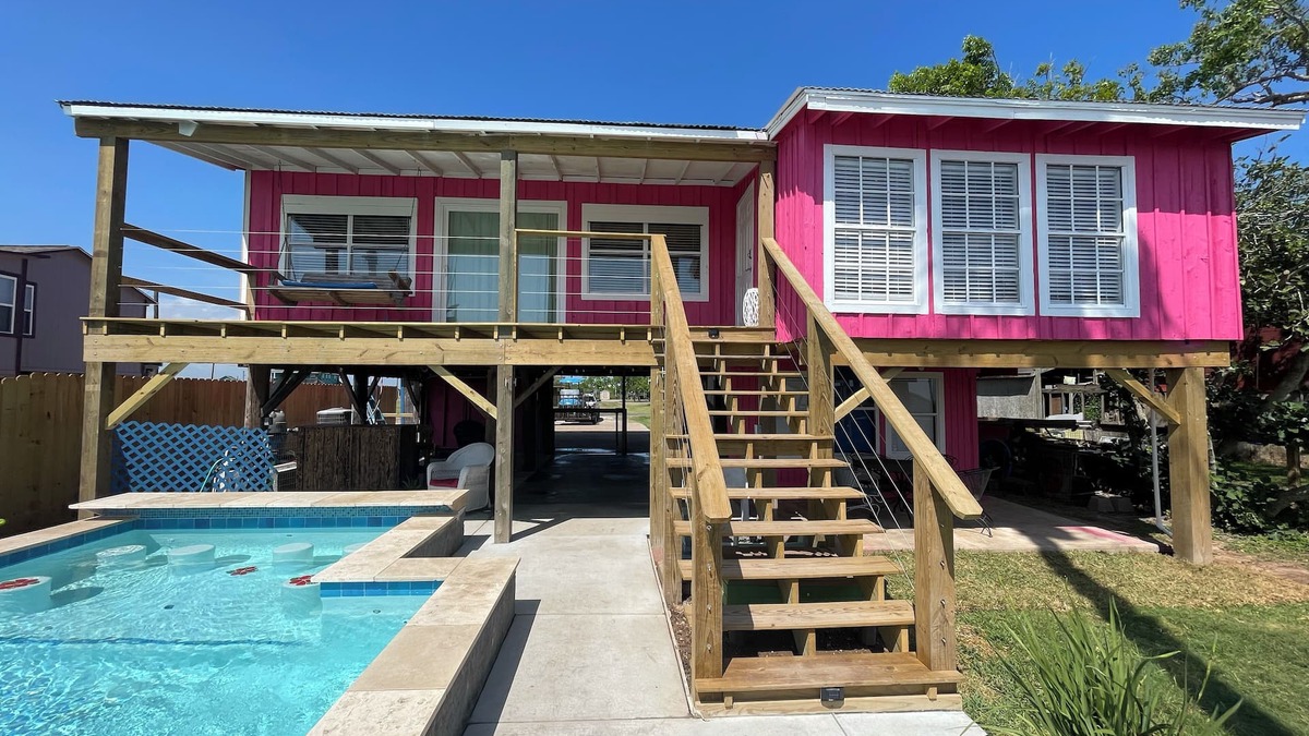 Cedar Lane House | Best Texas Fishing, Waterfront with a Swimming Pool and Pet Friendly
