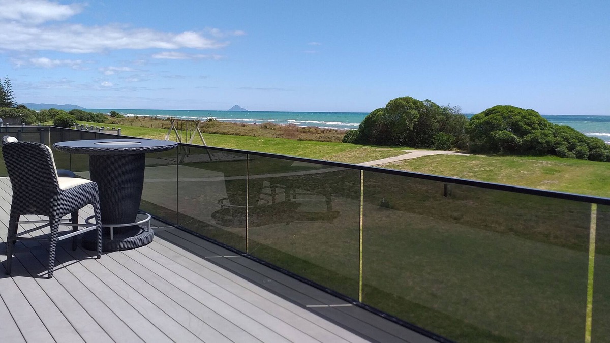 Waiotahi House | Big Black Beachfront Bach in family friendly community.