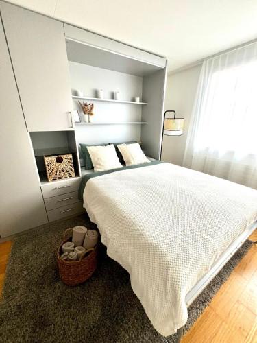 Faulensee Apartment | Bijou Serene klitzekleine Wohnung mit Seeblick