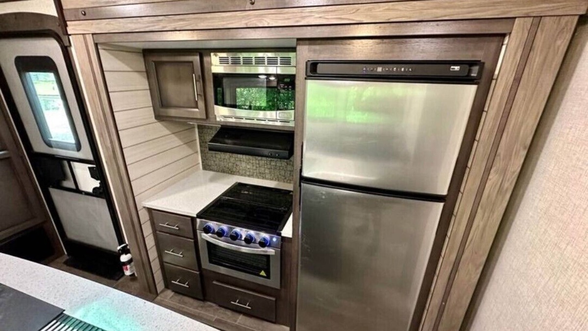 Lucas RV Rental | Black Fork River front fully functioning Camper
