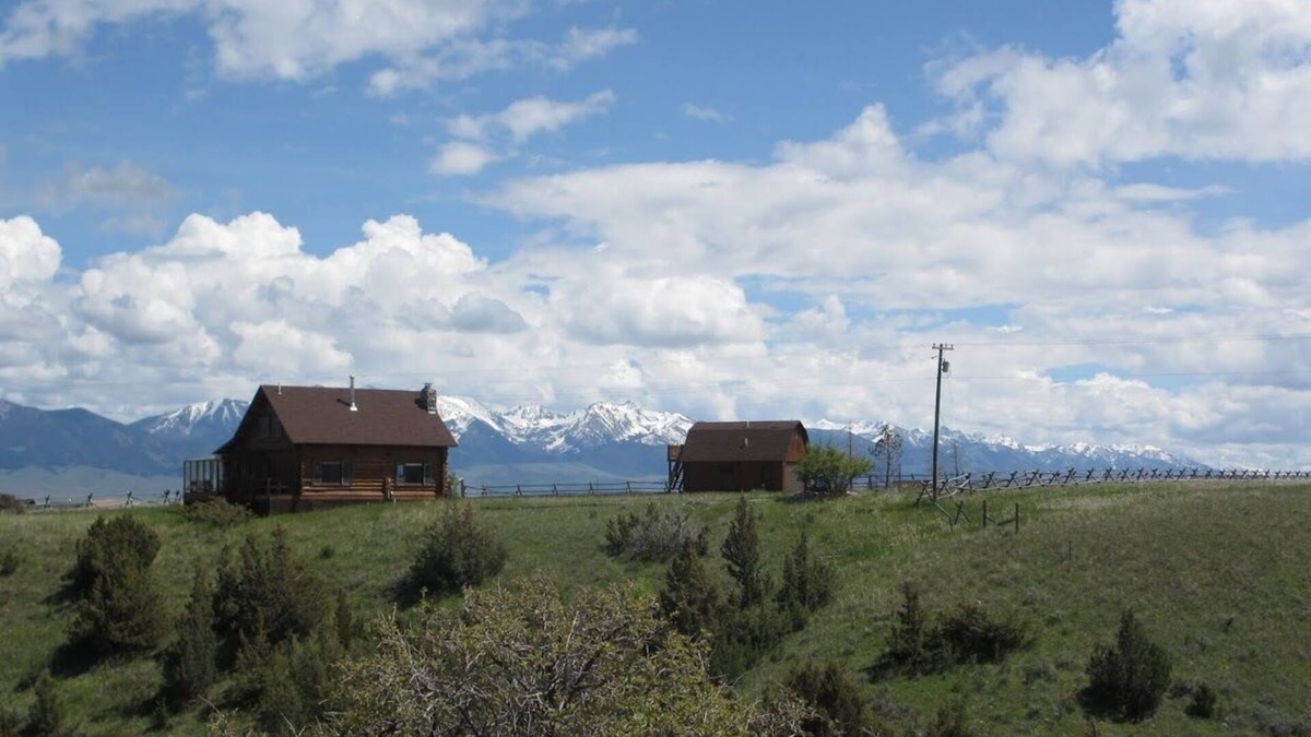 Shining Mountains Cabin | Blaine Creek Log Cabin with Spectacular views!