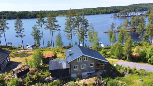 Skillingsfors House | Blockhütte Ratzeputz