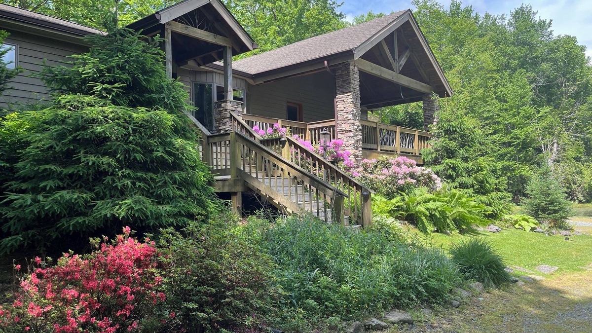 Blowing Rock House | Blowing Rock Retreat near Julian Price Park with stream and pond.