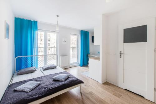 Krzyki Apartment | Blue Apartment with a terrace