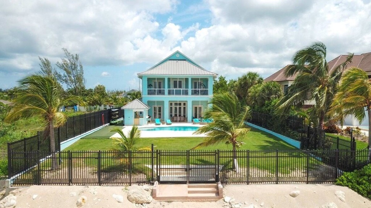 Coral Harbour House | Blue Birds Beach House, right on the beach with a large backyard & heated pool.