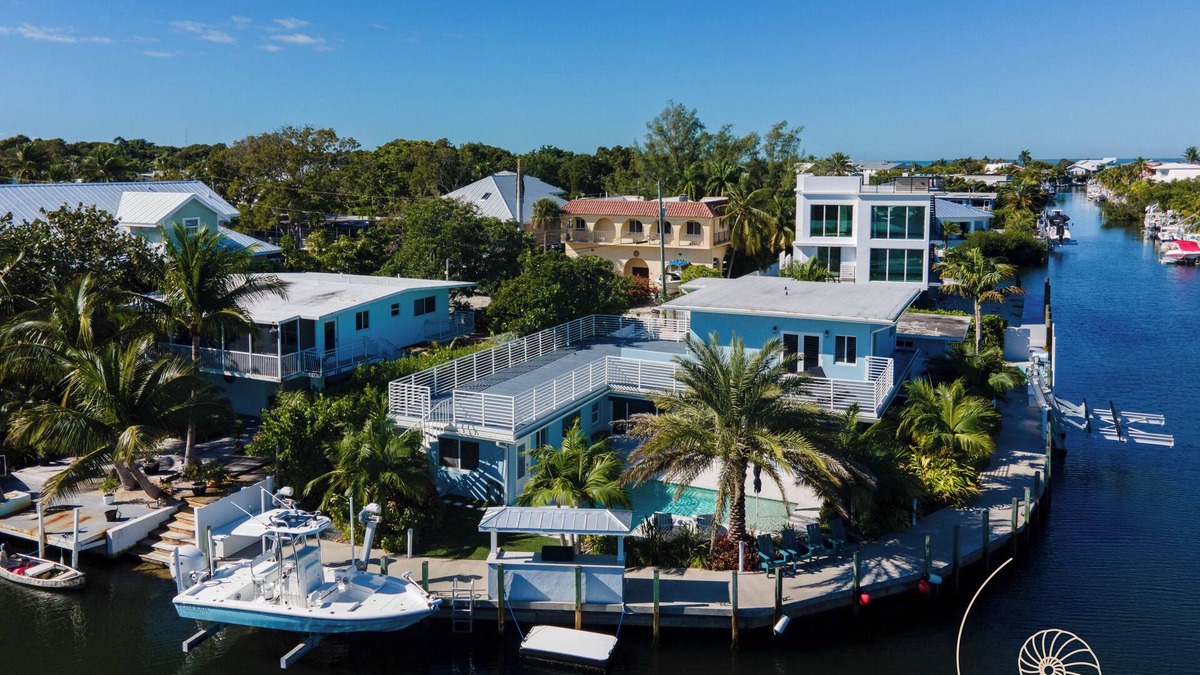 Tavernier House | Blue Palm Oasis ~ 4 Bedroom Plantation Key Home w/Pool & 170` of Dockage