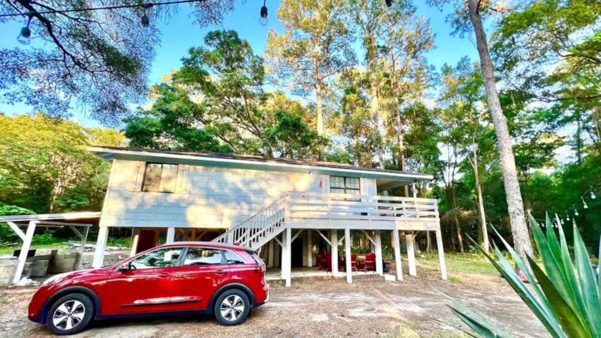 Fellowship House | Blue Sky StiltsHouse in a Secluded Forest.