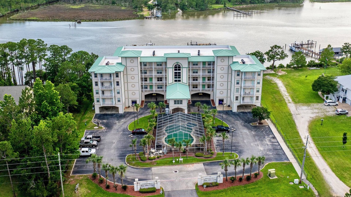 Gulf Shores Condo | BOAT SLIP! Stay Monthly Oyster Bay Retreat for 6! Waterfront Condo w/ Resort Ame