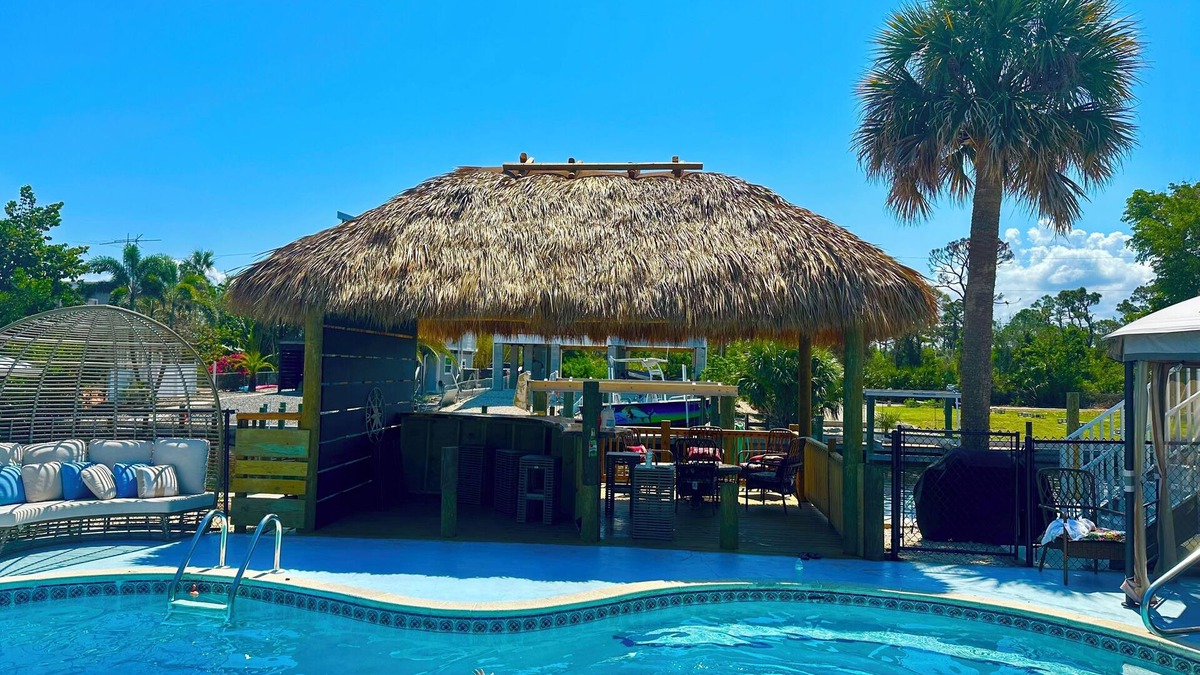 Bokeelia House | Boater’s Paradise! Beautiful Home on the Water with 2 Boat Lifts & Dockage Space