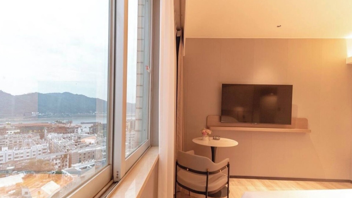 Wanxiu District Hotel | BORRMAN HOTEL WUZHOU