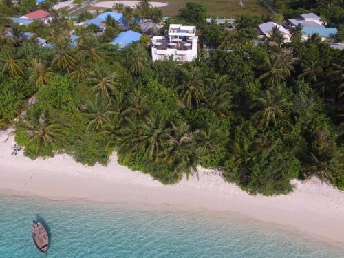 Dhigurah House | Boutique Beach All Inclusive Diving Hotel