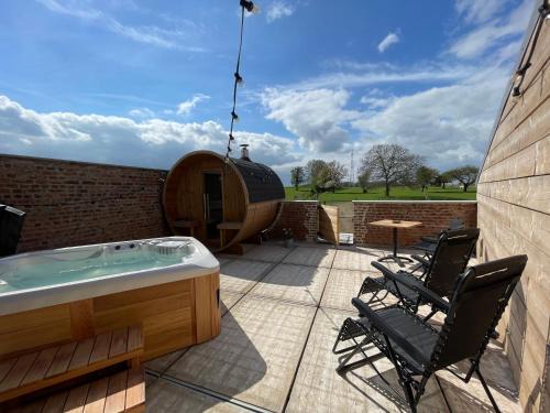 Millen Bed & Breakfast | Boven de paarden @ de Hoeveschuur