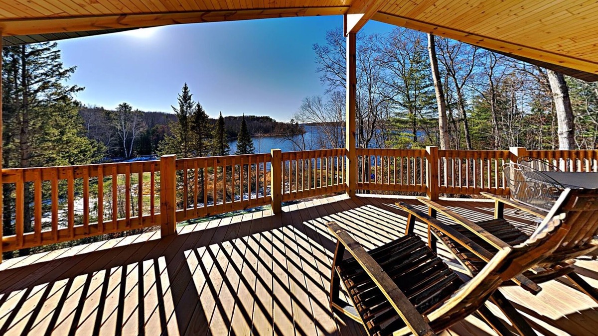 Chief Lake Cabin | Brand New 5 bedroom Lacourte Orellies lakefront home with covered deck and amazing lake views.