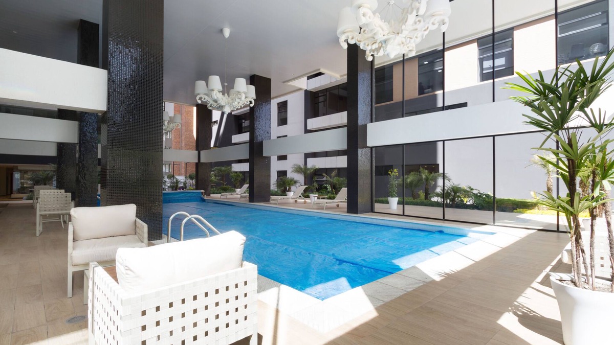 Financial District Apartment | BRAND NEW Great Location 1BDR 1.5BTH WI-FI POOL GYM 24HR GUARD NETFLIX PARKING