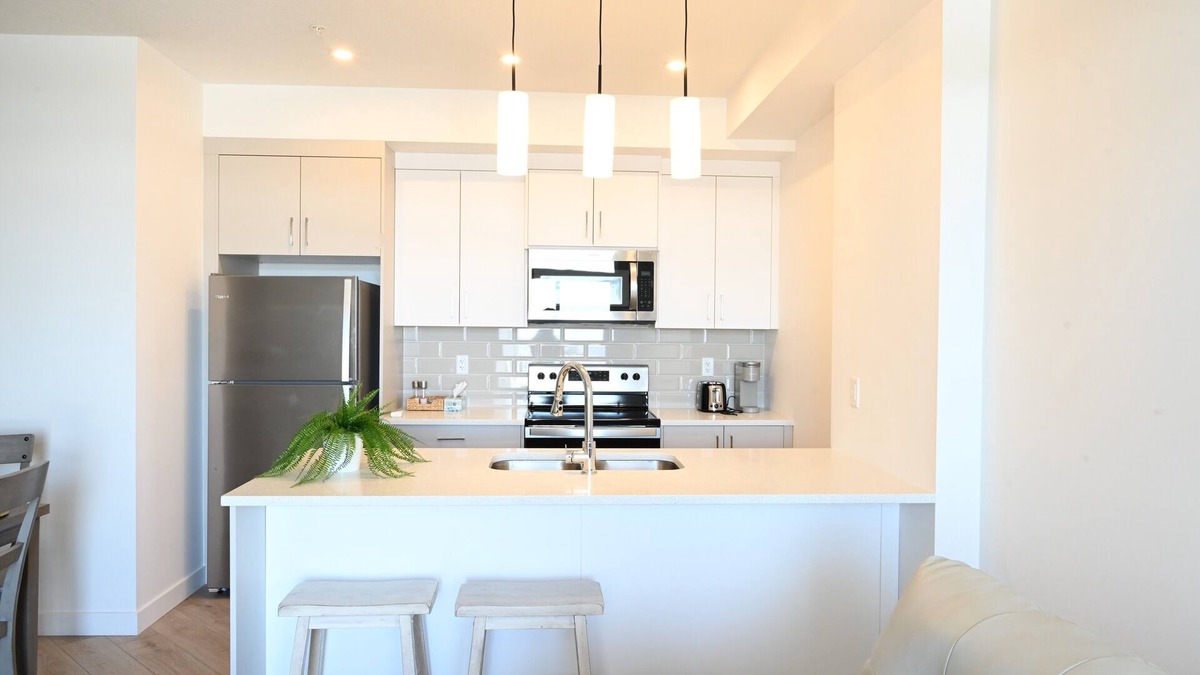 Springbank Hill Condo | Brand new top floor luxury condo with excellent park view and AC in west 17 Ave