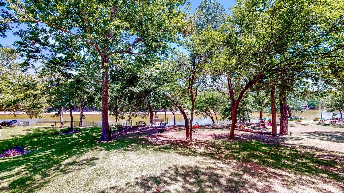 Glen Rose House | Brazos Riverfront Home on Large Waterfront Lot with Private Hot Tub & Canoe