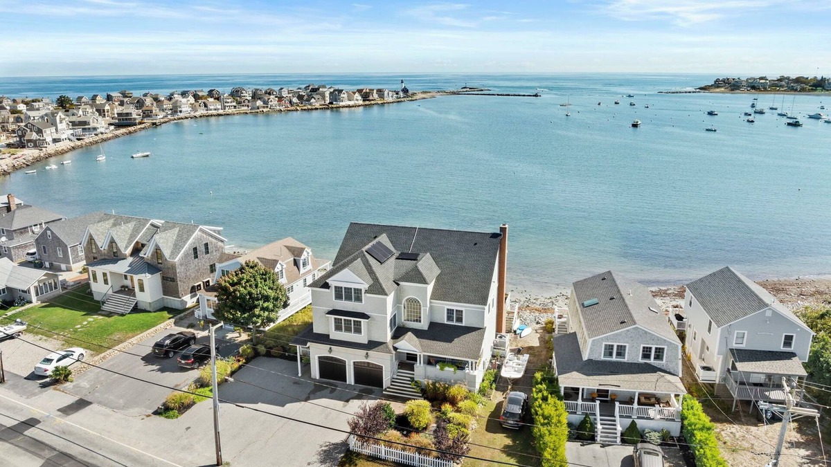 Scituate House | Breathtaking harbor views from spacious beachfront home.