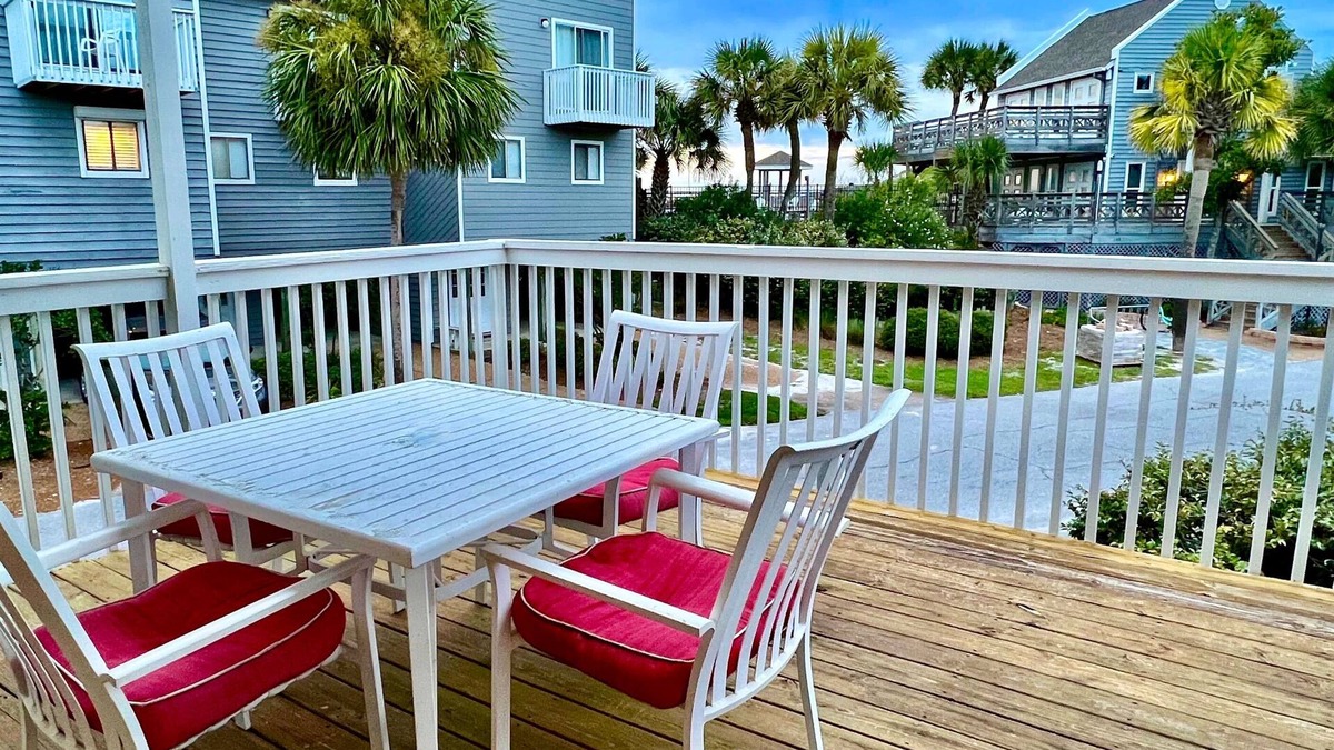 Port St. Joe House | Bright end unit across from pool -steps to beach ramp -beach chairs & cart incl.