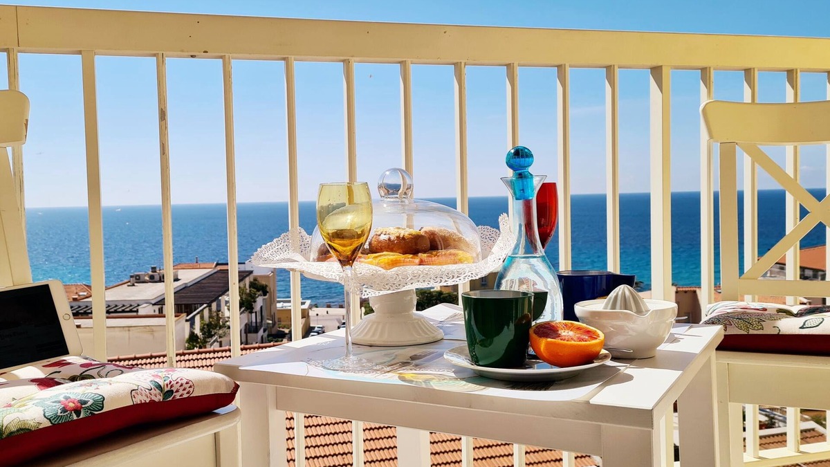 Alghero Apartment | Bright penthouse with incredible sea view in the center of Alghero with AC WiFi