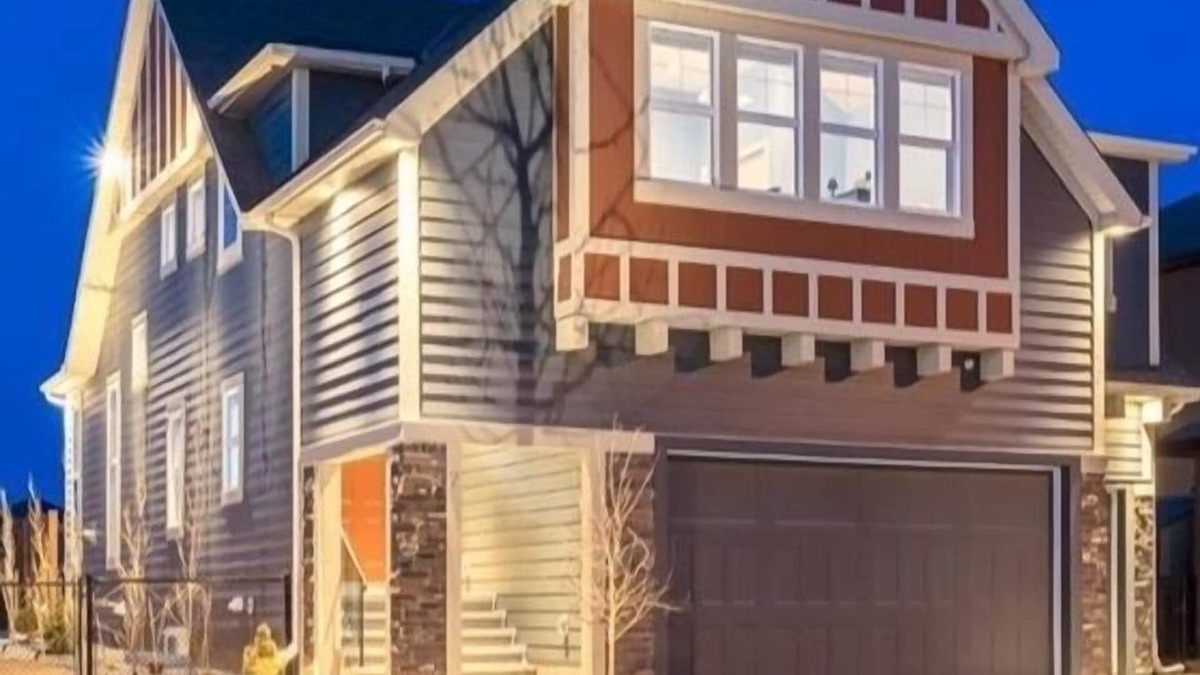 Okotoks House | Bright, spacious family home with great a outdoor space overlooking green space.
