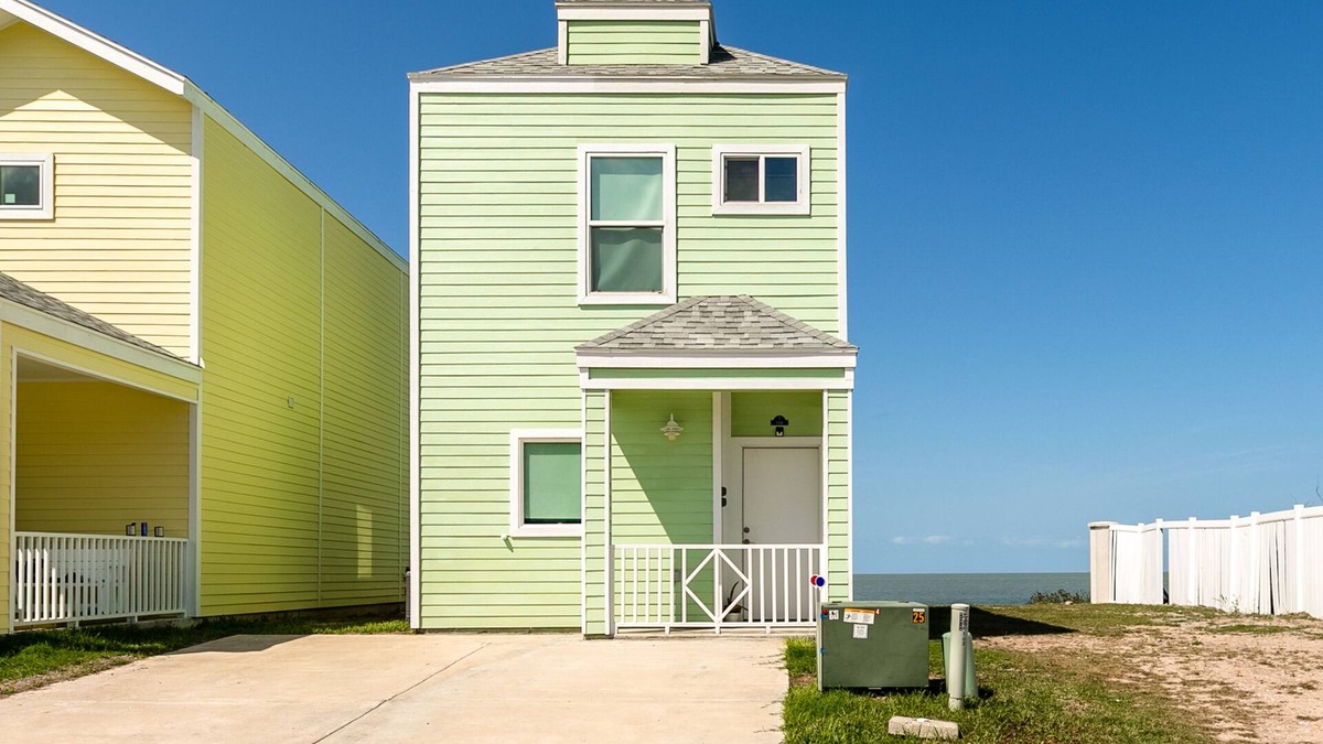 Port Isabel House | Bright Waterfront Home with Shared Pool, Water View, and High-Speed WiFi