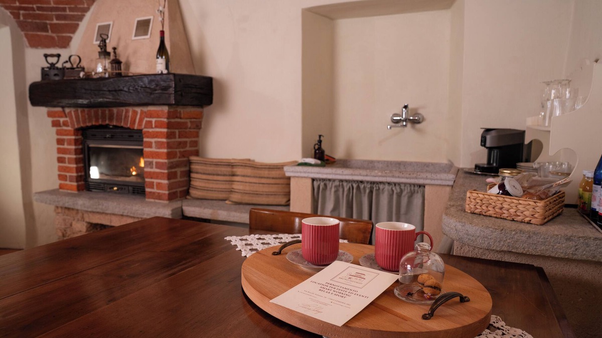 Lessona Bed & Breakfast | Bruno Selvago's Casba. Rustic house with exposed brick surrounded by vineyards.