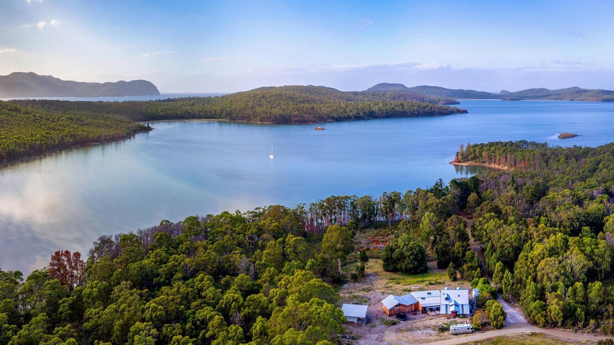 South Bruny Cabin | Bruny Island Lodge - Set amongst 860 acres of pristine bushland in remote South Bruny is The Lodge, a rustic timber chalet on the hill above Oyster Cove on Mickey’s Bay. The Lodge offers a unique experience on Bruny Island; it combines spectacular n