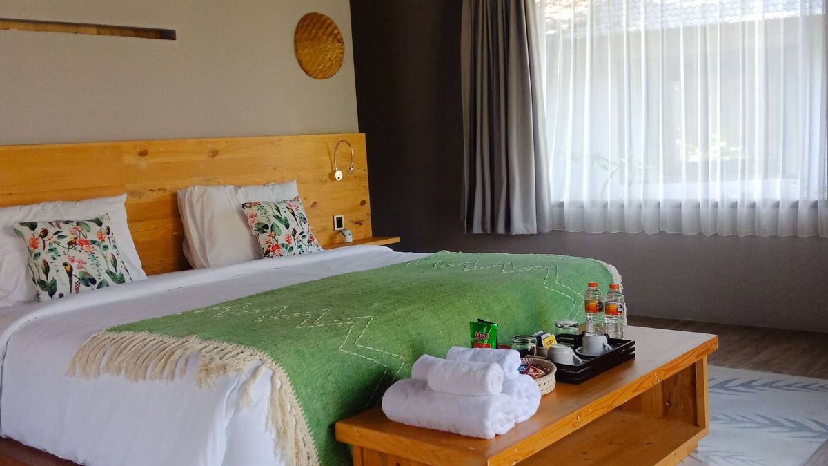 Padangsambian Klod House | Bungalow rooms with a big pool