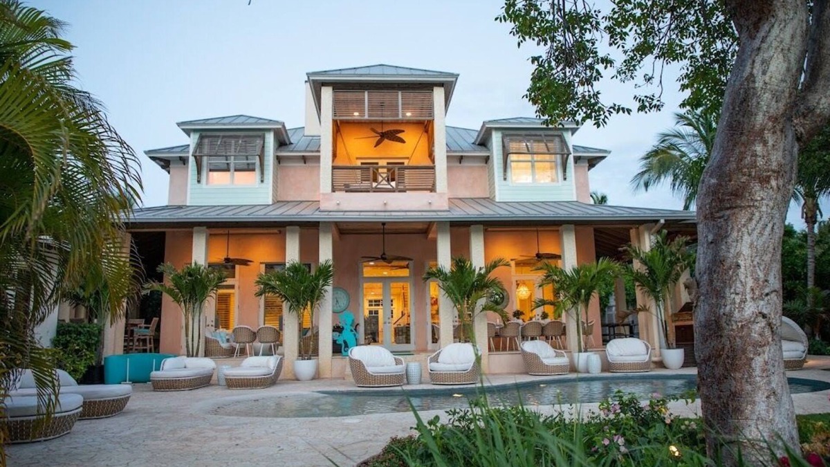 Dunmore Town House | Buttonwood – Bayfront Luxury Villa with Private Dock + Pink Sands Beach Access