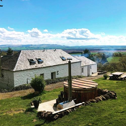 Port of Menteith House | Buzzard Cottage nestled in a hillside farm