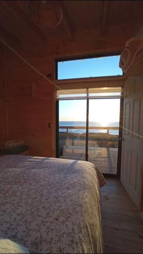 Pelluhue House | Cabaña Orca Lodge Norte frente al mar en Curanipe, Ideal para desconectar en pareja