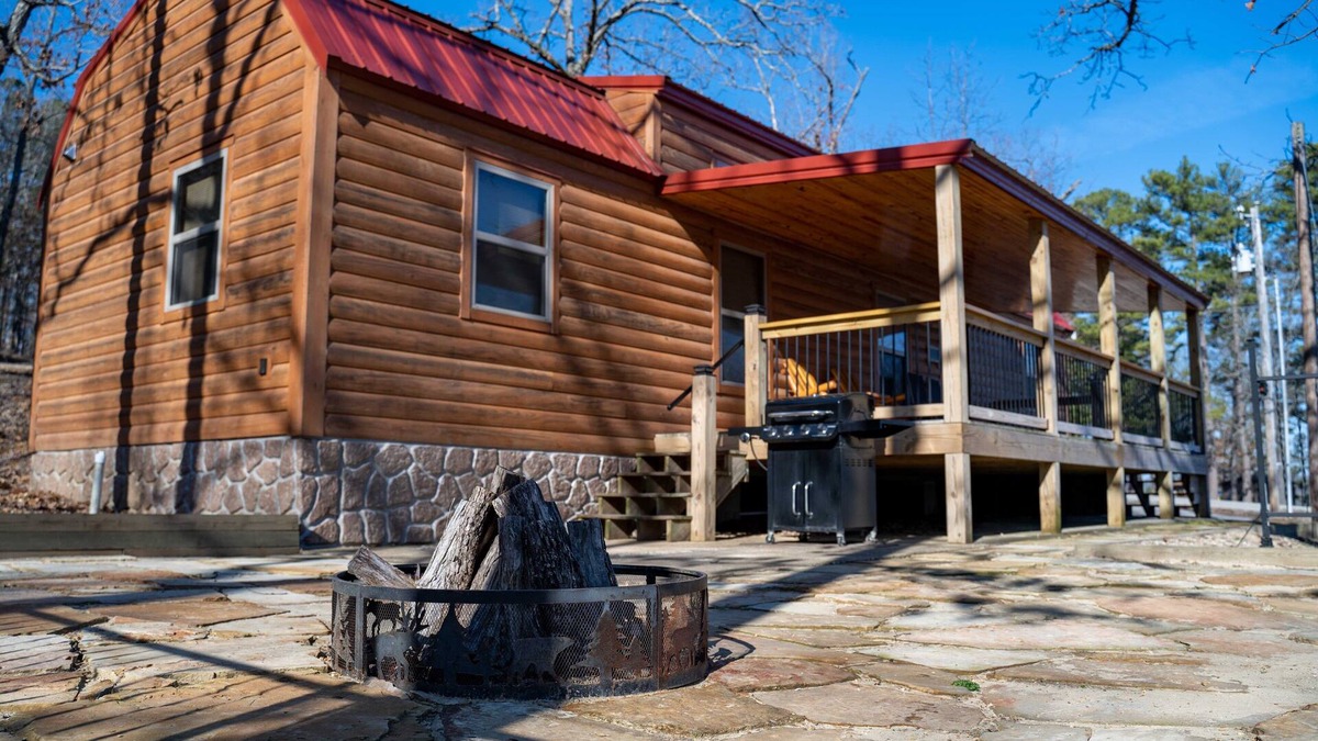 Gepp Cabin | Cabin featuring a vaulted ceiling, a large porch, and huge patio with fire pit.