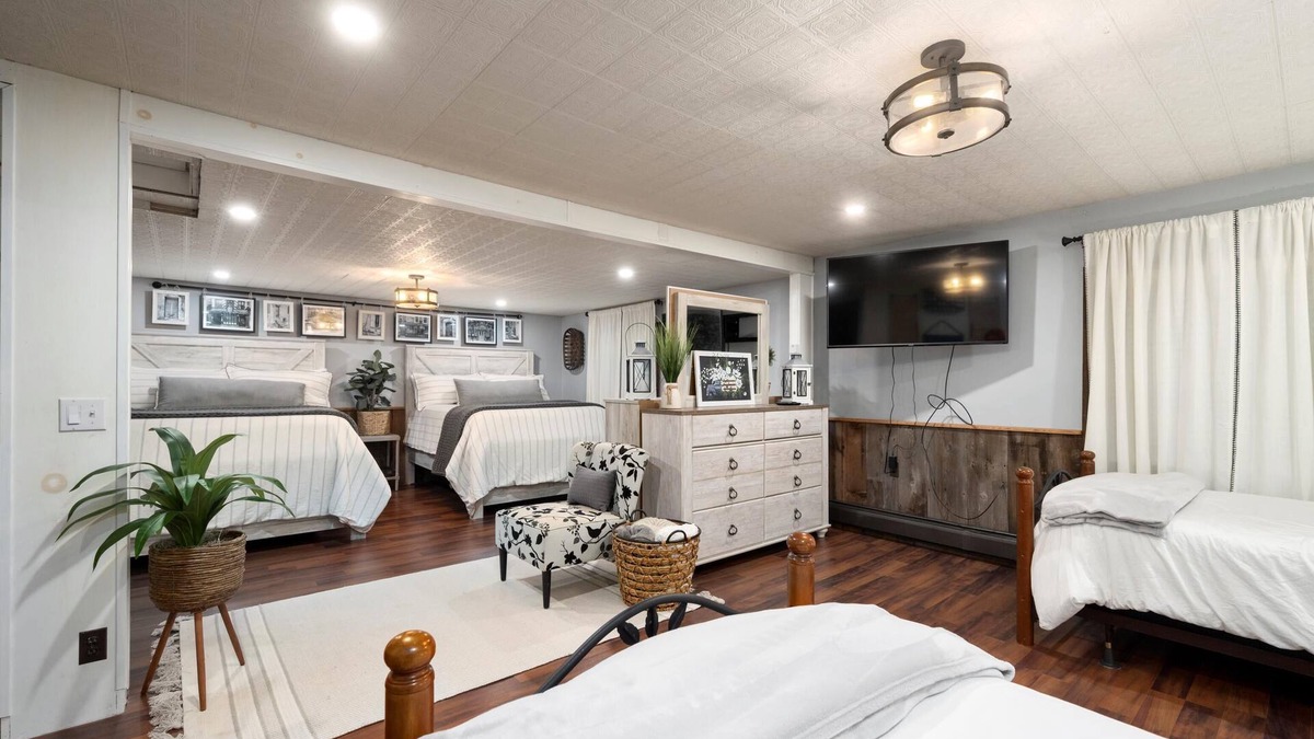 Warren Cabin | Cabin rental with Hot Tub, Fire Pit, mini fountain pond, hammocks, corn hole.
