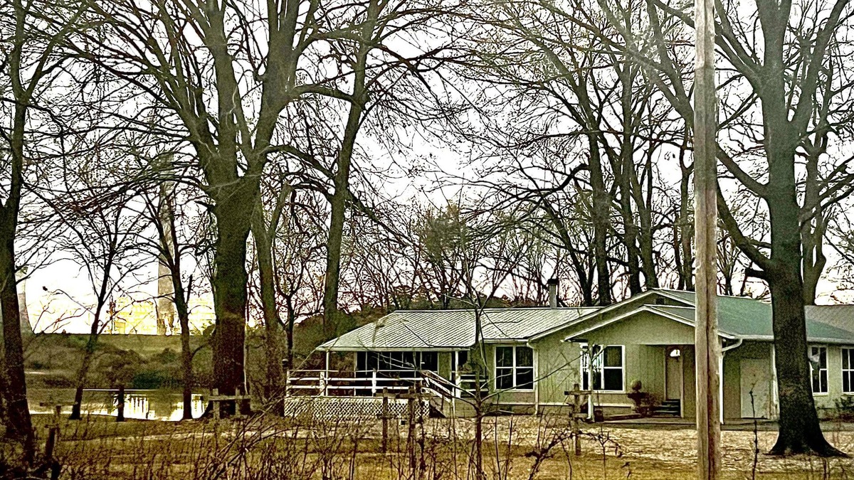 Wright House | Cabin sits in the back of a wild pecan grove over looking the Arkansas River