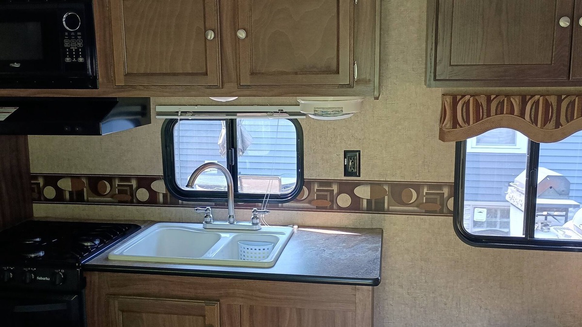 Burton House | Camper with AC/Heat, fire pit, private lake , 4 SUP in Burton - Punderson