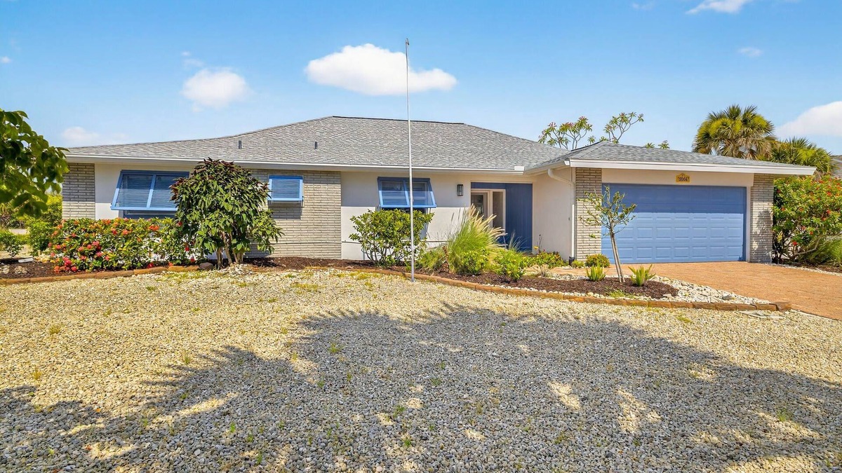 Shell Harbor House | Canal front beauty! NEW