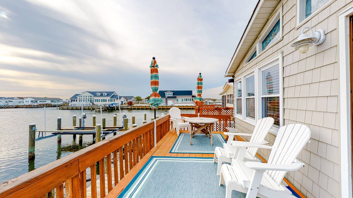 Montego Bay House | Canal front home with free WiFi, deck, private dock, shared pool & tennis