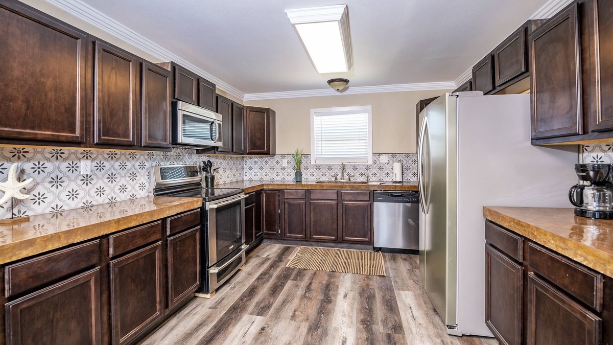 Cedar Lane House | Canal Front Home with Boat Ramp and Pier. Newly Remodeled!!