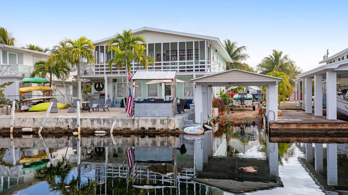 Little Torch Key House | Canal-front Keys escape with amazing view, boat access, firepit, gril, AC, & W/D