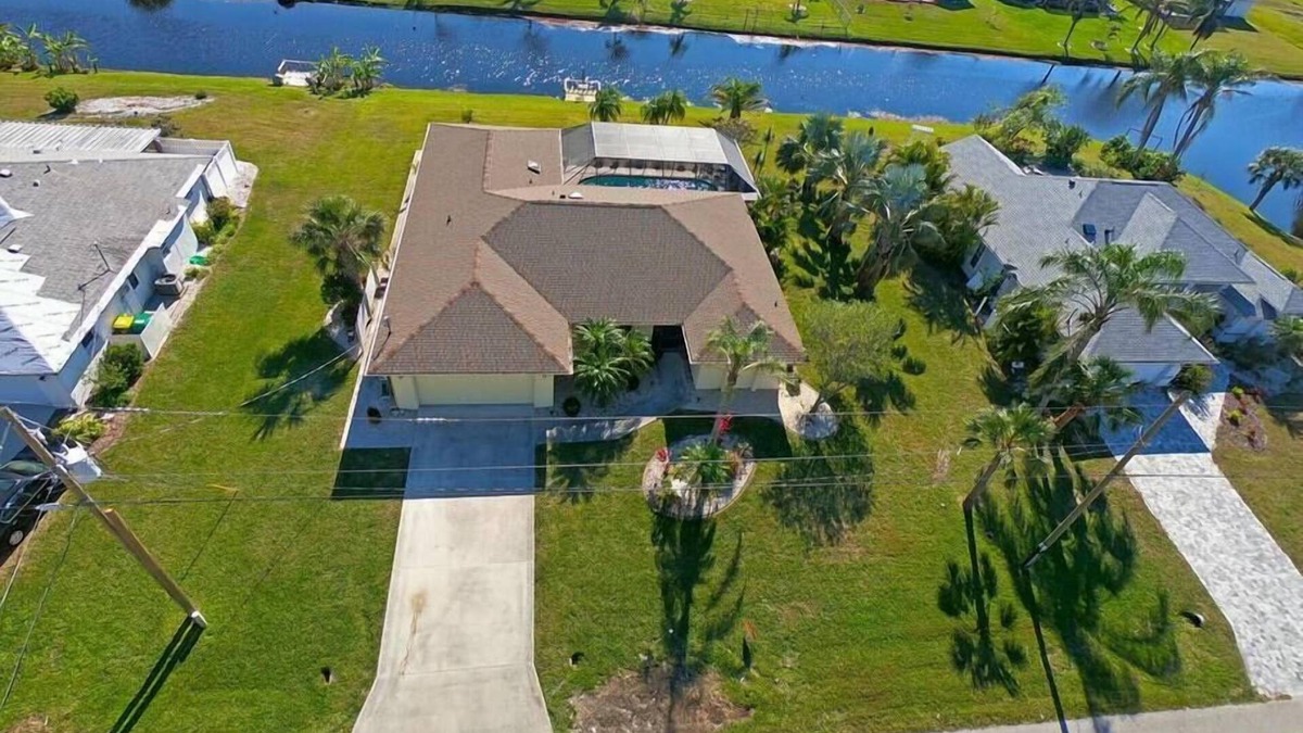 Pebble Beach House | Canal-Side: Pool Home in Rotonda West #61